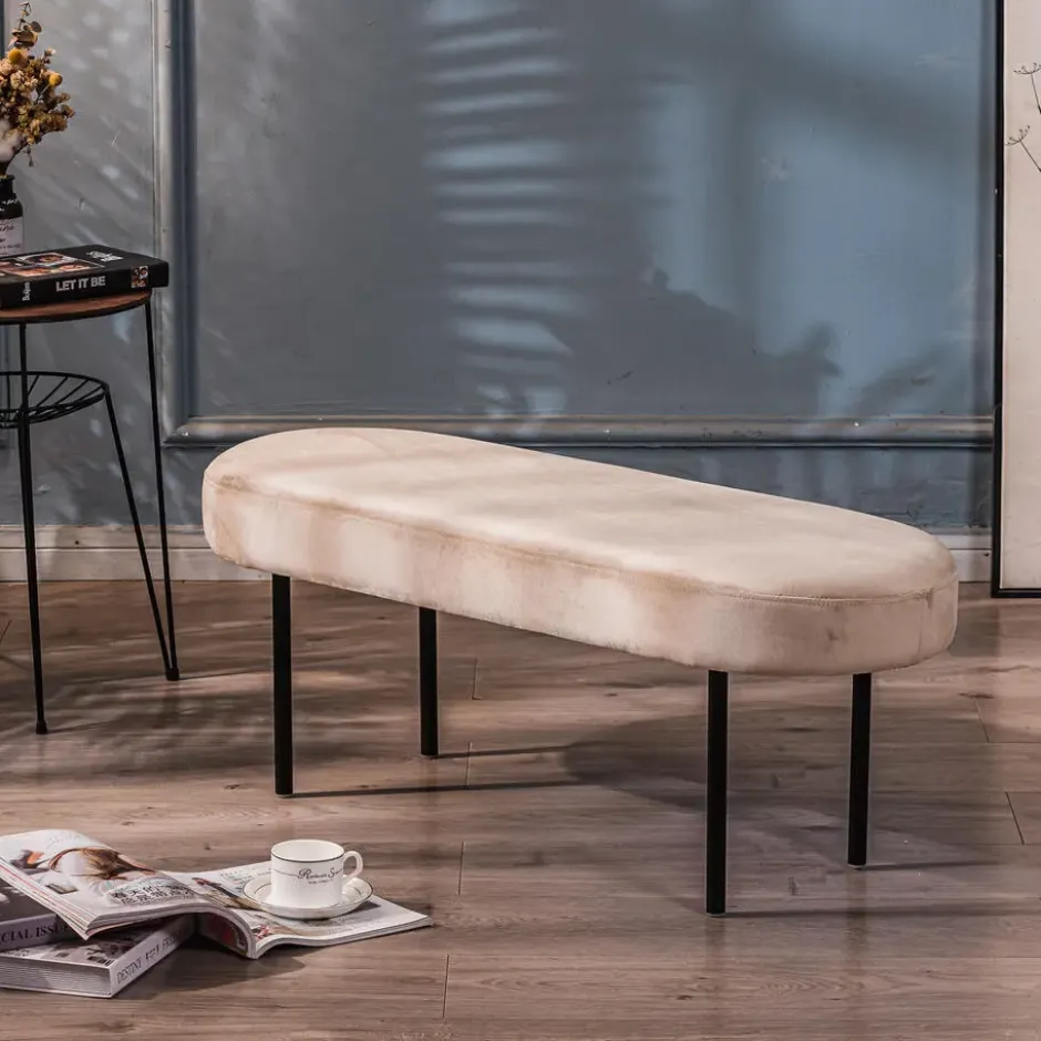 Metalen en fluwelen beige bank
