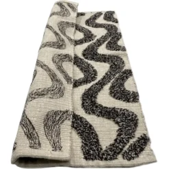 Rechthoekig katoenen tapijt met beige en zwarte motieven 60 x 90 cm