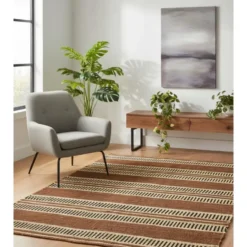 Rechthoekig katoenen tapijt met bruine en ecru motieven 90 x 60 cm