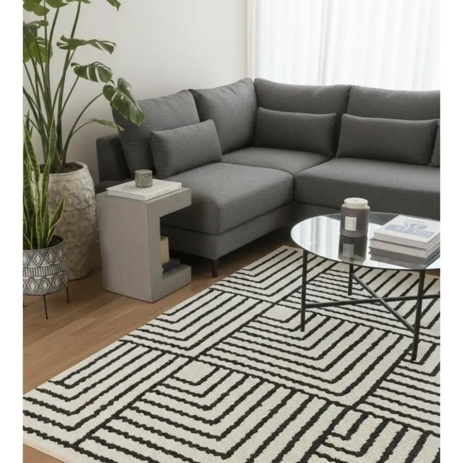 Rechthoekig katoenen tapijt met beige en zwarte motieven 120 x 180 cm
