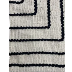 Rechthoekig katoenen tapijt met beige en zwarte motieven 120 x 180 cm