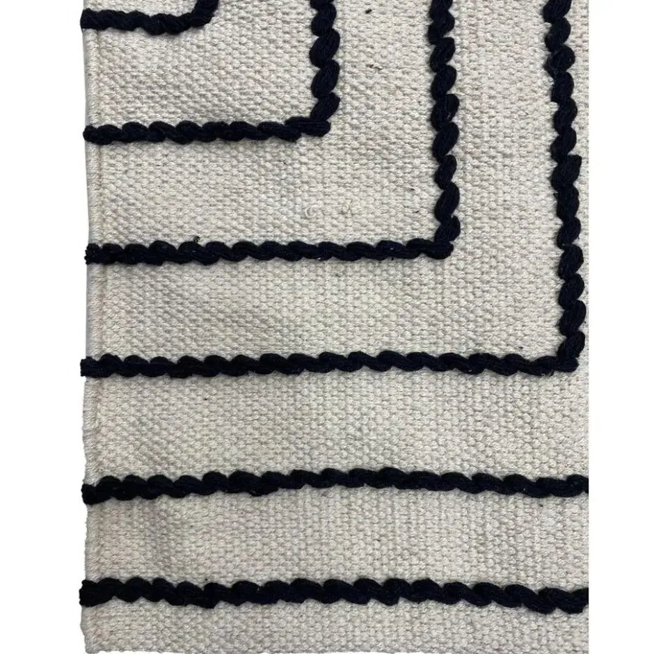 Rechthoekig katoenen tapijt met beige en zwarte motieven 90 x 60 cm