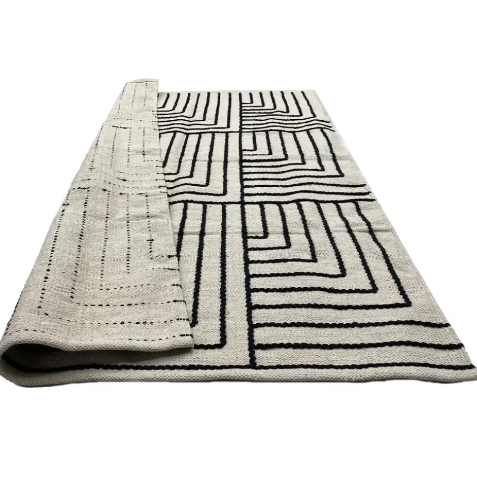 Rechthoekig katoenen tapijt met beige en zwarte motieven 90 x 60 cm