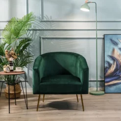Retro stijl groene fluwelen en metalen salon fauteuil