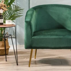 Retro stijl groene fluwelen en metalen salon fauteuil