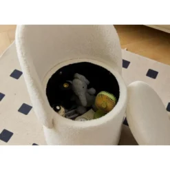 Salonpoef met rugleuning en opbergruimte in witte bouclé