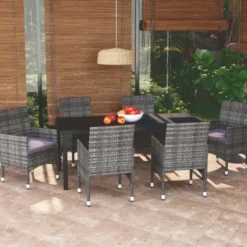 vidaXL - 7-delige Tuinset met kussens - Grijs - Poly rattan en HKC - 185x90 cm