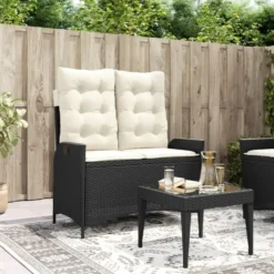 vidaXL - Verstelbare loungebank met crème kussens - Zwart rattan - 104x59x93 cm